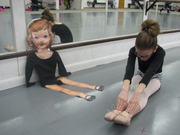 Flat S at ballet, three