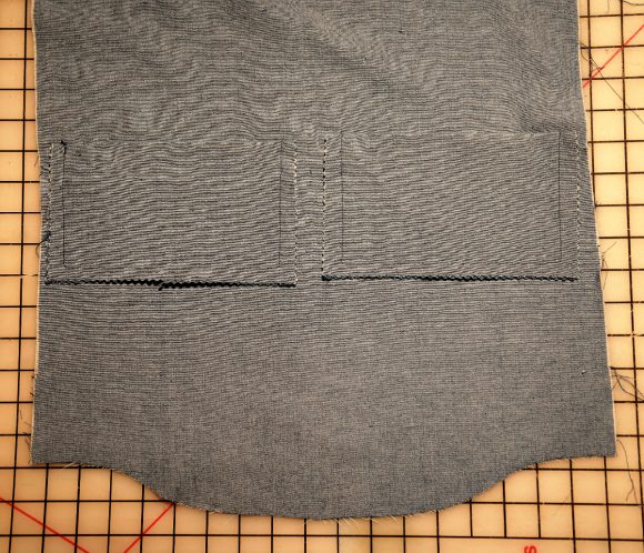 exposed zippers on welt pockets