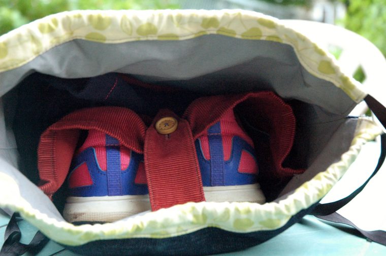Interior pocket in drawstring backpack