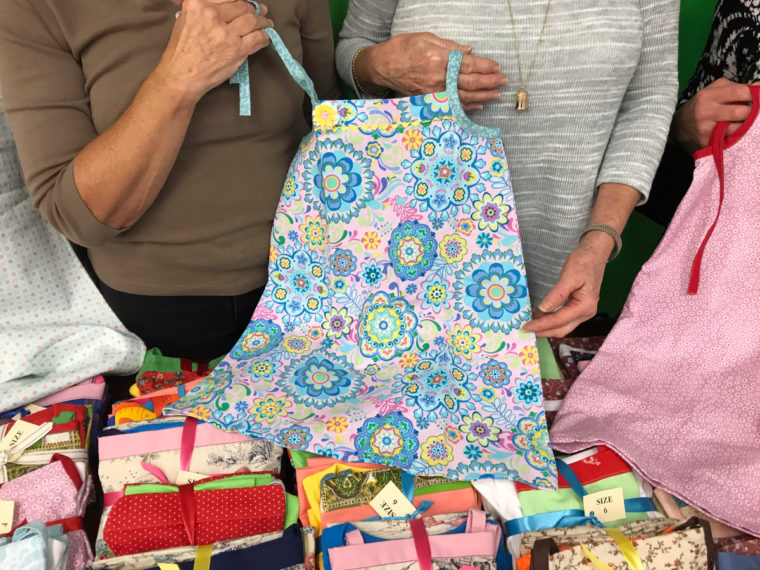 The ladies of a Virginia sewing organization made 72 Popover Sundresses to donate to charity.