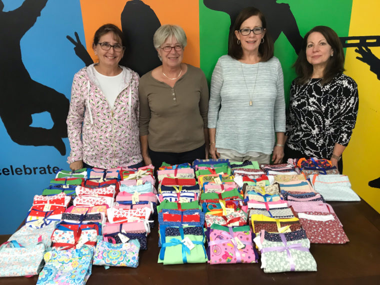 The ladies of a Virginia sewing organization made 72 Popover Sundresses to donate to charity.