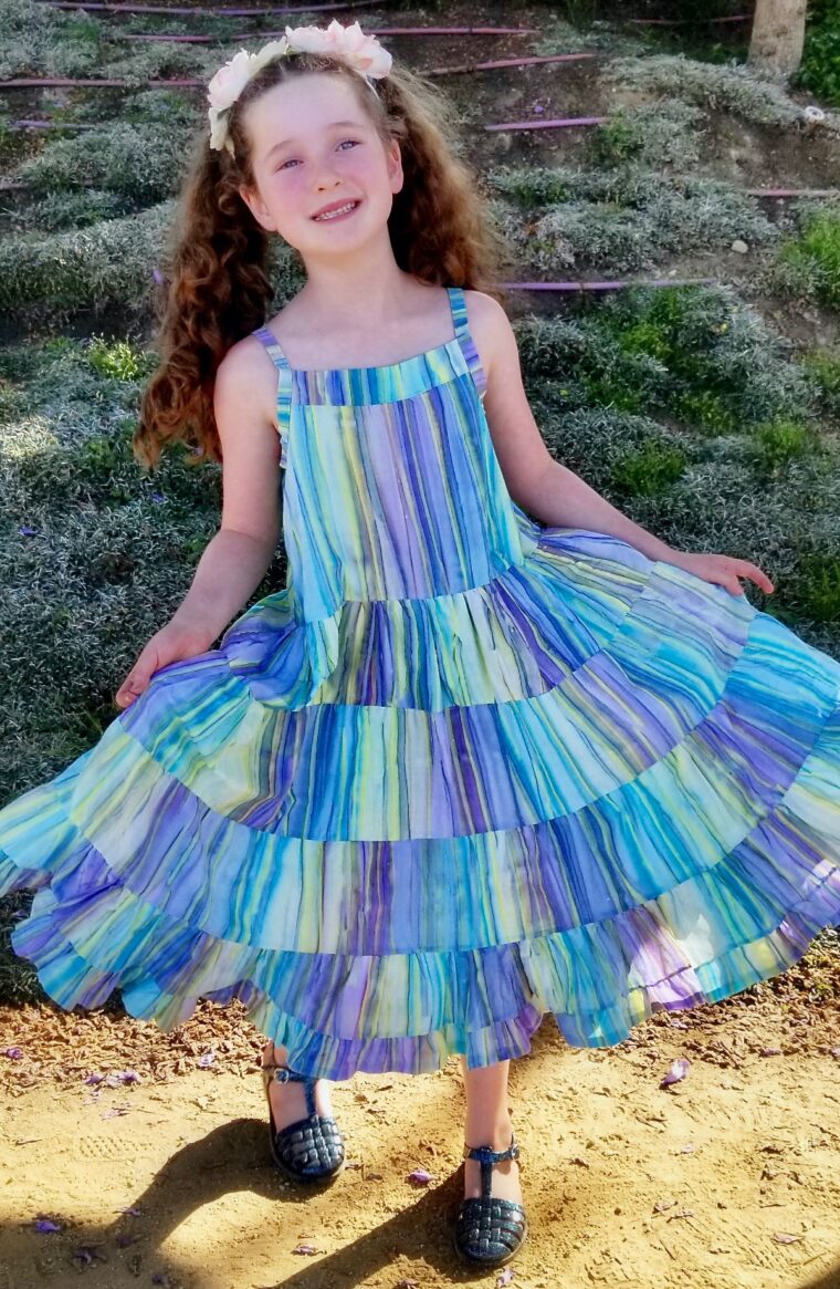 Learn to sew this adorable child's dress in sizes 2-8 with our free pattern and tutorial.