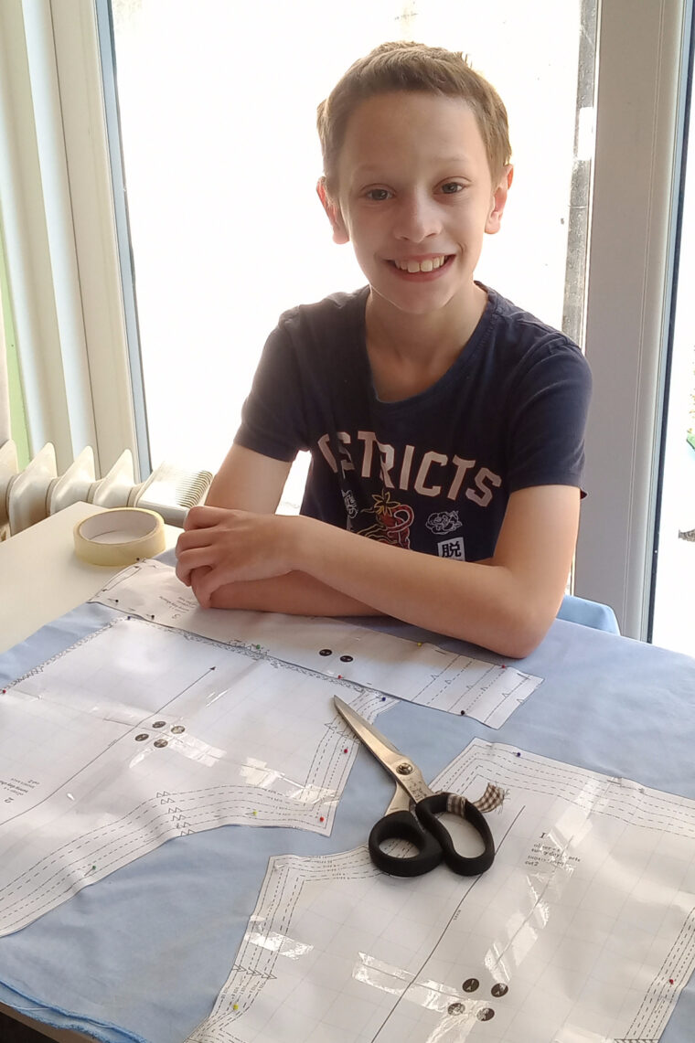 Teach a boy to sew his own shorts.