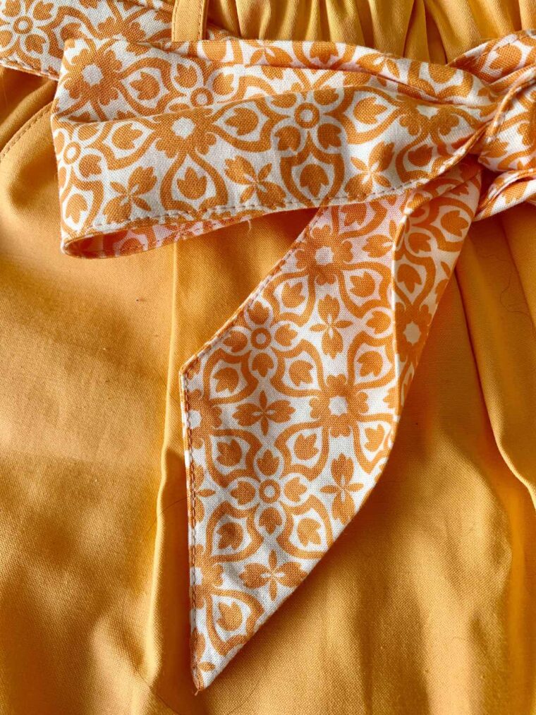 Liesl + Co Lisboa Shorts-orange with a printed bow