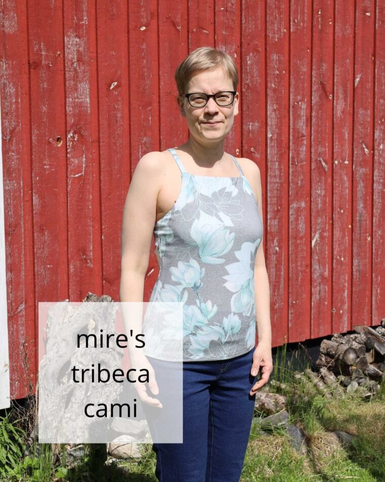 Woman standing in front of a barn wearing Liesl + Co Tribeca Knit Cami