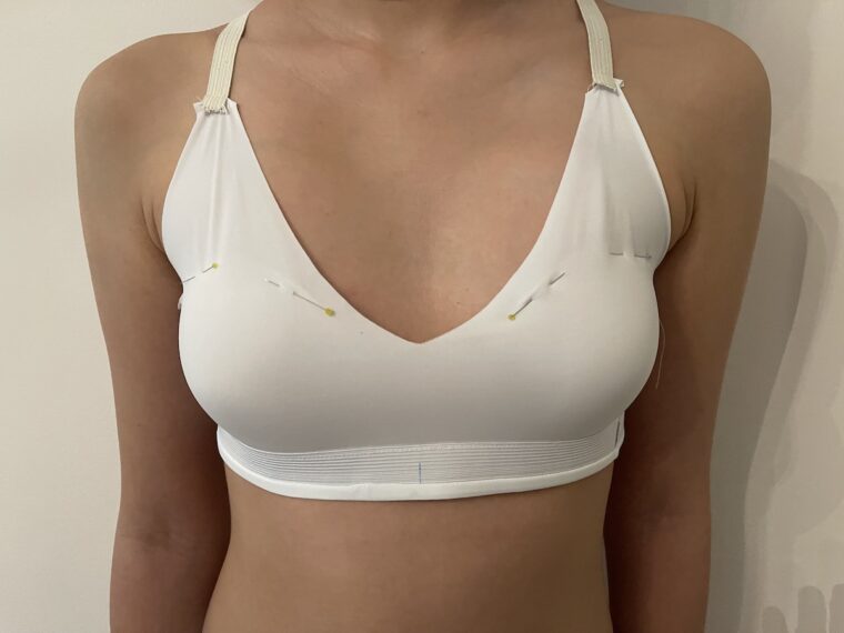 Liesl + Co Tribeca Cami shelf bra with bra cups positioned and pinned in place