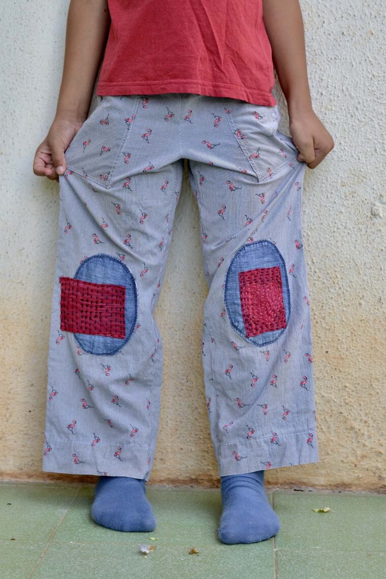 Oliver + S Sandbox Pants with visible mending on the knees