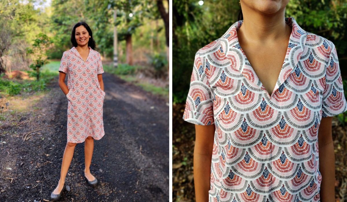 Woman wearing a knee-length rayon scallop print dress with short sleeves and a v-neck collar