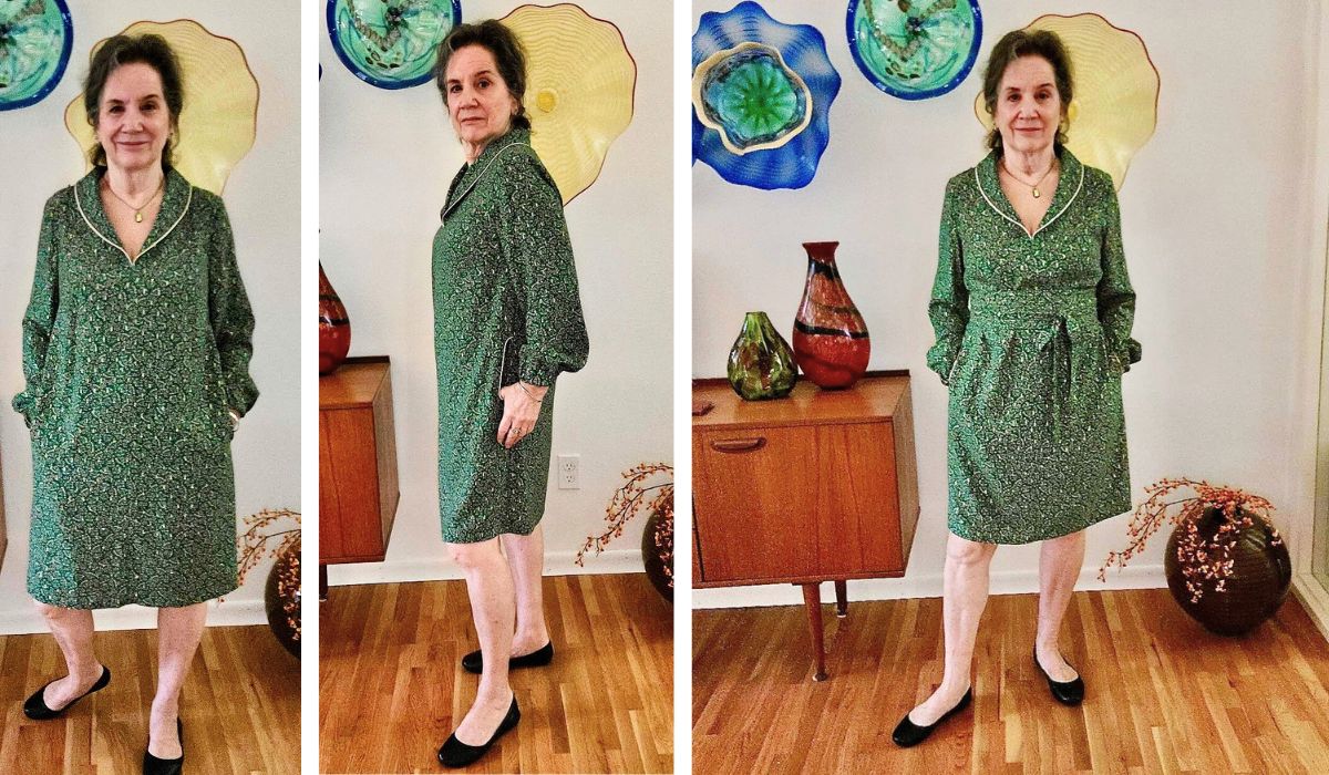 Woman wearing a green v-neck pullover dress with long sleeves and pockets. We see the front and side views of the dress.
