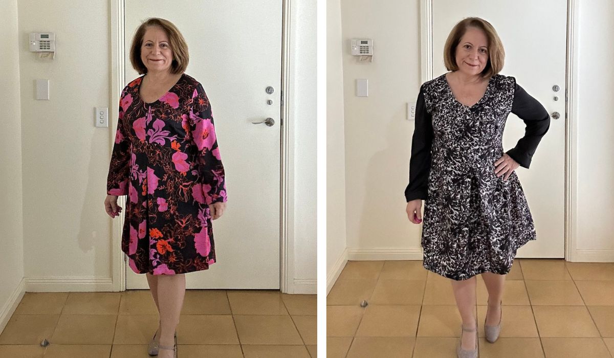 A standing woman wearing a pink and black long-sleeved dress on the left.  She is wearing the same style dress on the right but the body is printed in black and white and the sleeves are solid black.