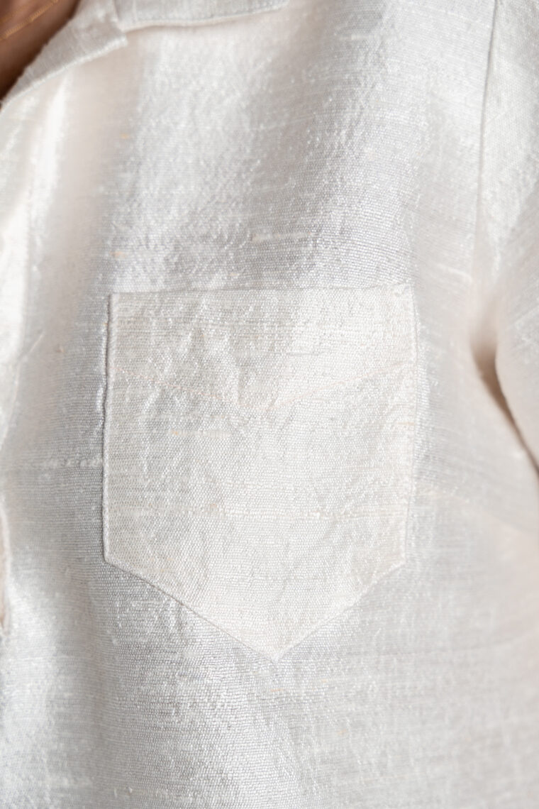 chest pocket for the Liesl + Co Cyprus Woven Polo