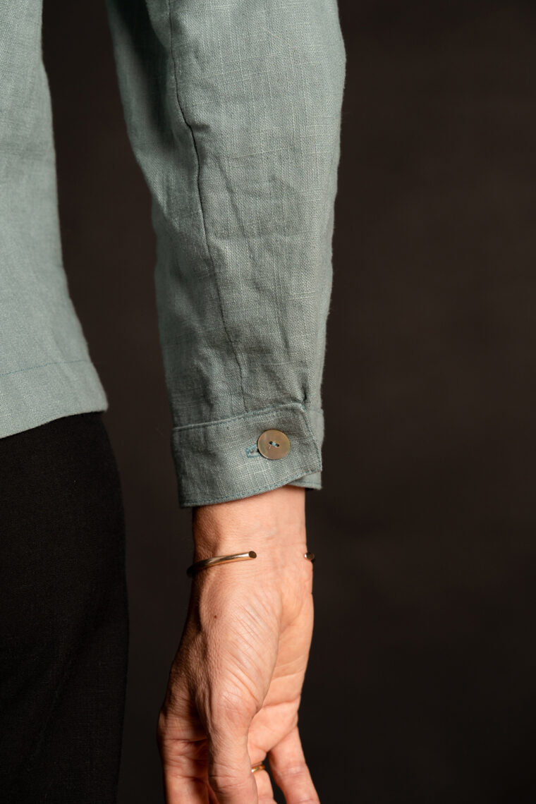 long sleeve cuff detail of Liesl + Co Cyprus Woven Polo